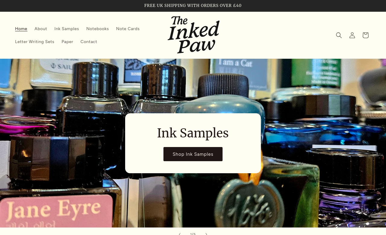 Screenshot of The Inked Paw website homepage